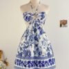 Vestido mini bohemio con estampado floral azul y escote halter
