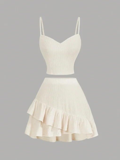 Conjunto crop albaricoque con top de tirantes y falda asimétrica - vista frontal.