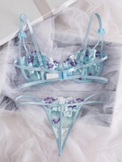 Parte trasera del conjunto sexy de lencería multicolor con tirantes ajustables.