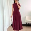 Vestido elegante asimétrico rojo violeta largo visto de frente.